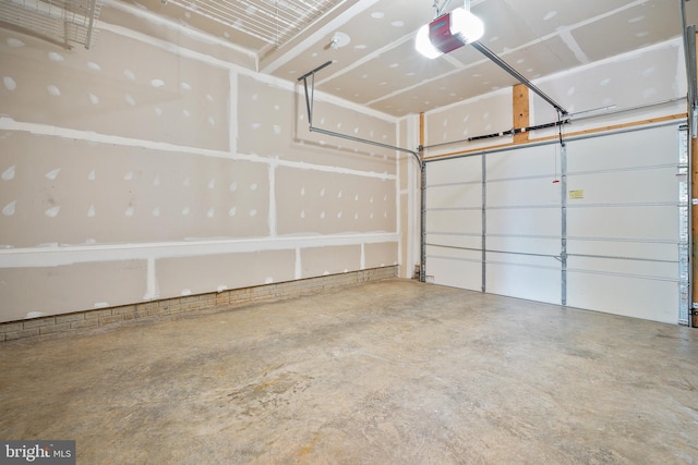 22788 Sagamore Sq, Brambleton, VA 20148 - garage featuring a garage door opener