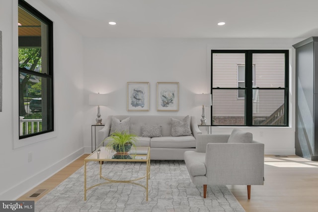 1904 Jackson St NE, Washington, DC 20018 - living room featuring visible vents, recessed lighting, baseboards, and wood finished floors