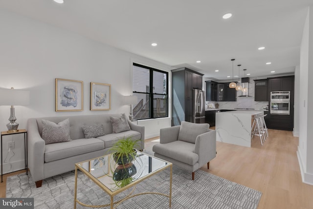 1904 Jackson St NE, Washington, DC 20018 - living area featuring recessed lighting and light wood-style flooring
