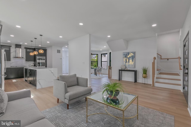 1904 Jackson St NE, Washington, DC 20018 - living area with visible vents, stairs, baseboards, light wood-type flooring, and recessed lighting