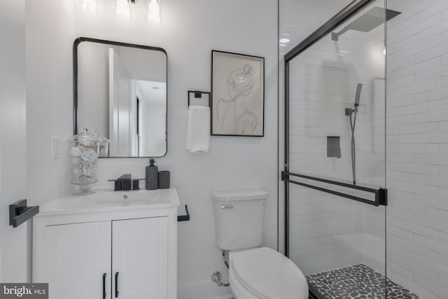 1904 Jackson St NE, Washington, DC 20018 - bathroom featuring vanity, a stall shower, and toilet