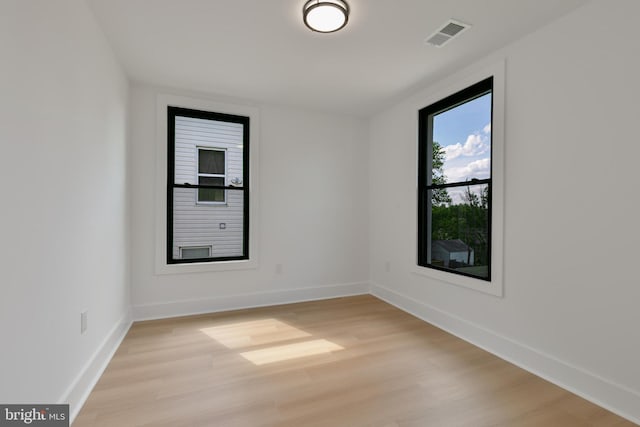 1904 Jackson St NE, Washington, DC 20018 - empty room with light wood-style floors, baseboards, and visible vents
