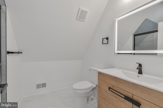 1904 Jackson St NE, Washington, DC 20018 - bathroom with visible vents, marble finish floor, vaulted ceiling, and toilet