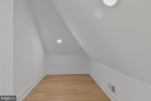 1904 Jackson St NE, Washington, DC 20018 - additional living space featuring visible vents, light wood finished floors, baseboards, and vaulted ceiling