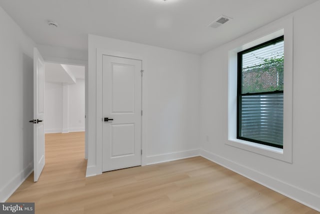 1904 Jackson St NE, Washington, DC 20018 - unfurnished room with light wood-style floors, baseboards, and visible vents