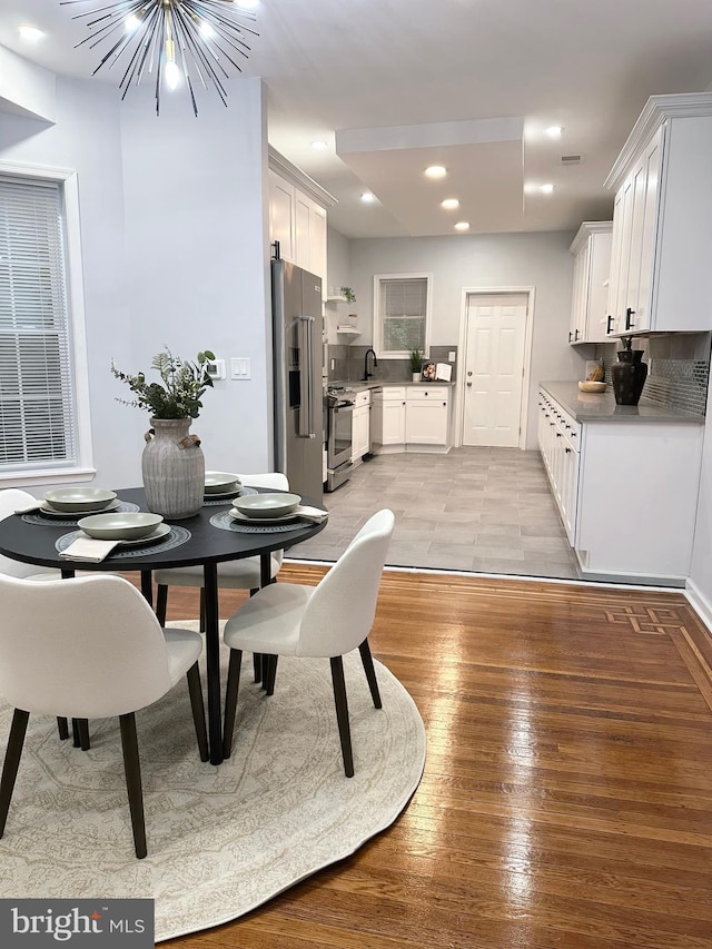 1724 N 62nd St, Philadelphia, PA 19151 - dining room featuring light wood-style floors, a chandelier, and recessed lighting