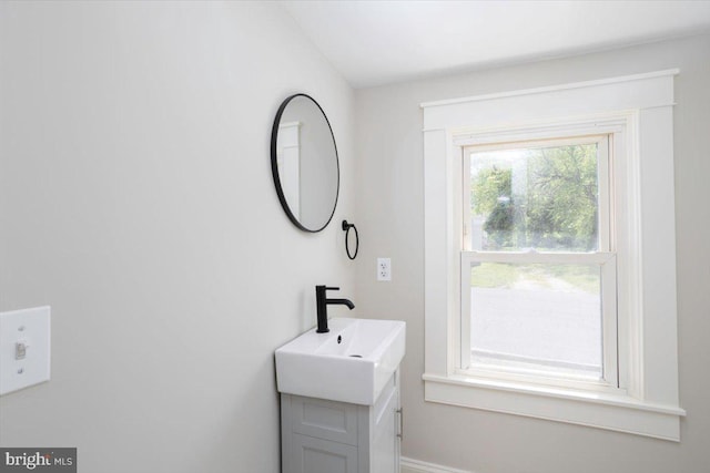 223 Henry St, Cambridge, MD 21613 - bathroom featuring baseboards and vanity