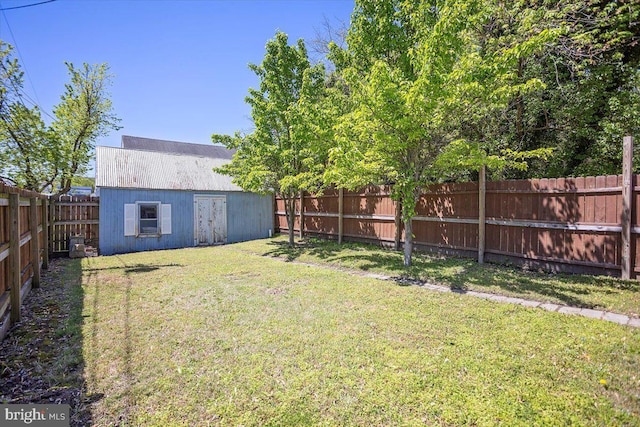 223 Henry St, Cambridge, MD 21613 - view of yard with an outdoor structure and a fenced backyard