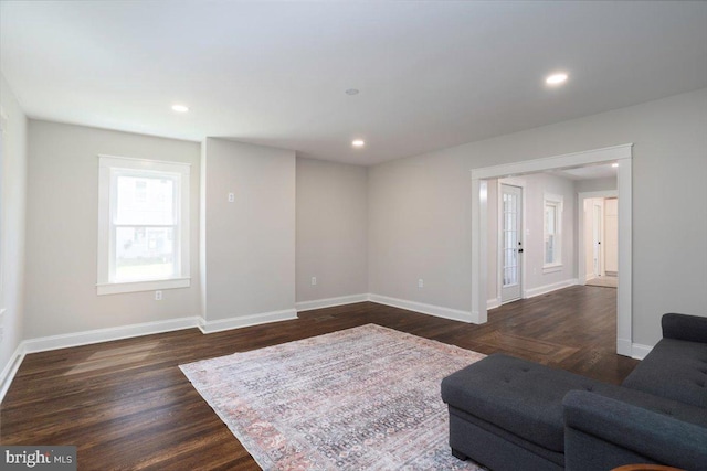 223 Henry St, Cambridge, MD 21613 - living area featuring recessed lighting, baseboards, and dark wood-style floors