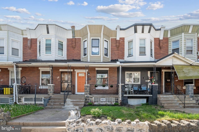 1544 N Allison St, Philadelphia, PA 19131 - multi unit property featuring a porch and brick siding