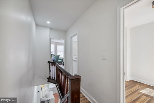 1544 N Allison St, Philadelphia, PA 19131 - hall with baseboards, recessed lighting, wood finished floors, and an upstairs landing