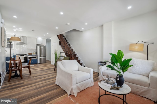 1544 N Allison St, Philadelphia, PA 19131 - living room with recessed lighting, baseboards, stairs, and wood finished floors