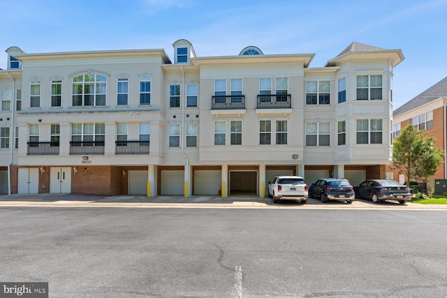 8600 Liberty Trl Unit 102, Manassas, VA 20110 - view of property featuring an attached garage