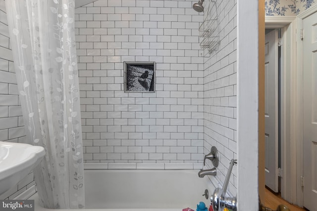 bathroom featuring shower / bath combination with curtain