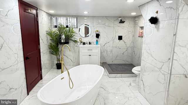 full bathroom featuring a shower stall, vanity, marble finish floor, a soaking tub, and recessed lighting