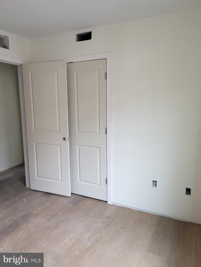 1386 Haddon Ave, Camden, NJ 08103 - unfurnished bedroom featuring light wood-style flooring and a closet