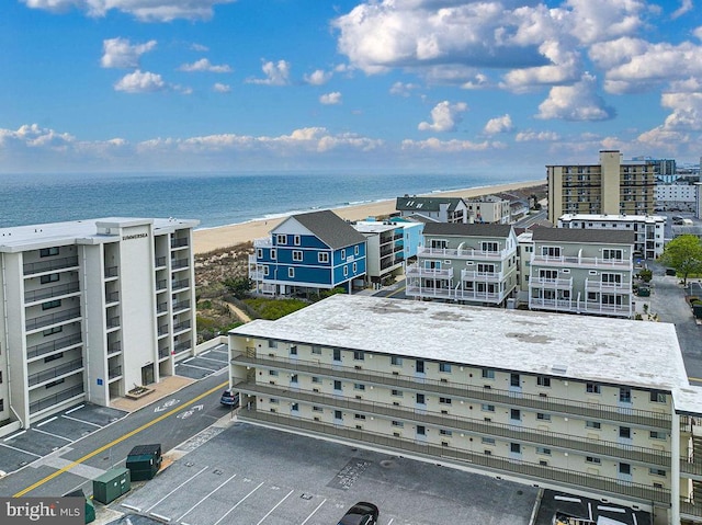 aerial view featuring a water view and a view of city