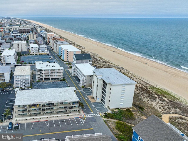 aerial view featuring a water view and a view of the beach
