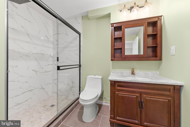 full bathroom featuring a marble finish shower, vanity, and toilet