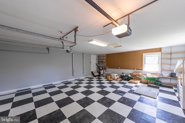 garage featuring a garage door opener