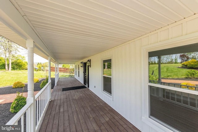 wooden deck featuring covered porch