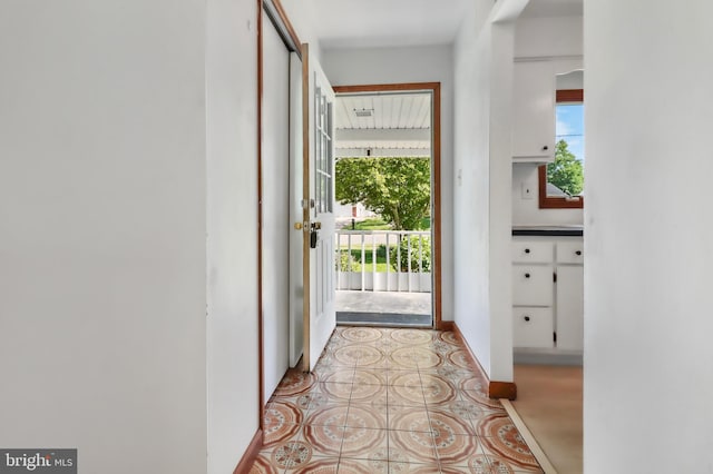 doorway with baseboards