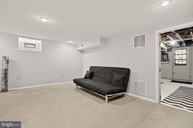 living area with recessed lighting, baseboards, and visible vents