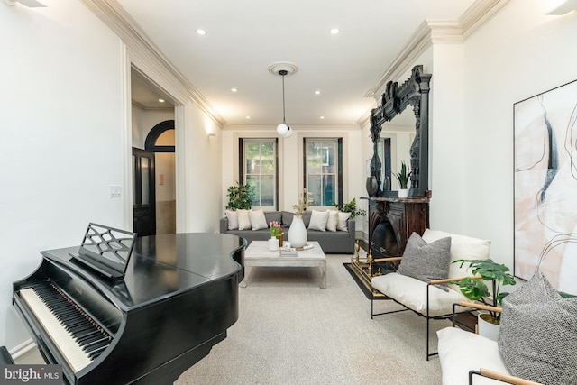 living room featuring crown molding, recessed lighting, and arched walkways