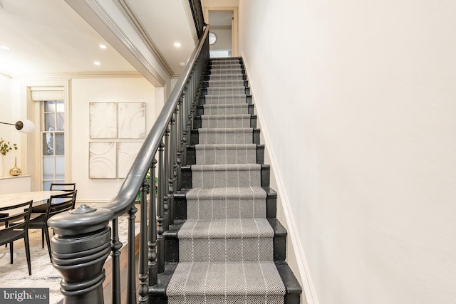 stairs with recessed lighting, baseboards, and ornamental molding