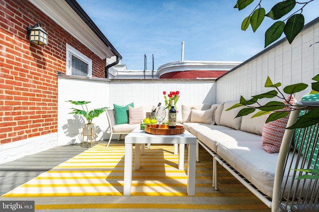 exterior space with an outdoor living space
