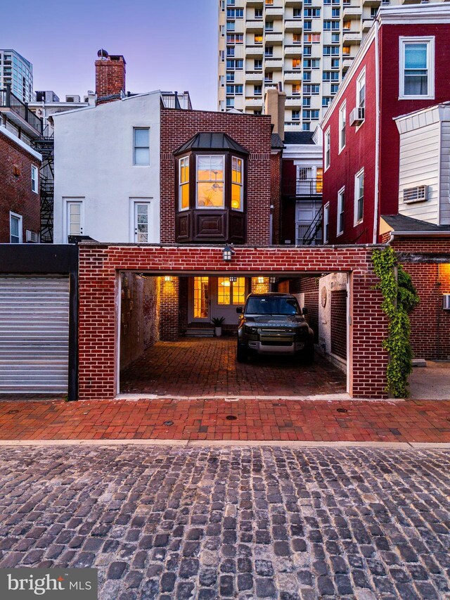 back of property with brick siding