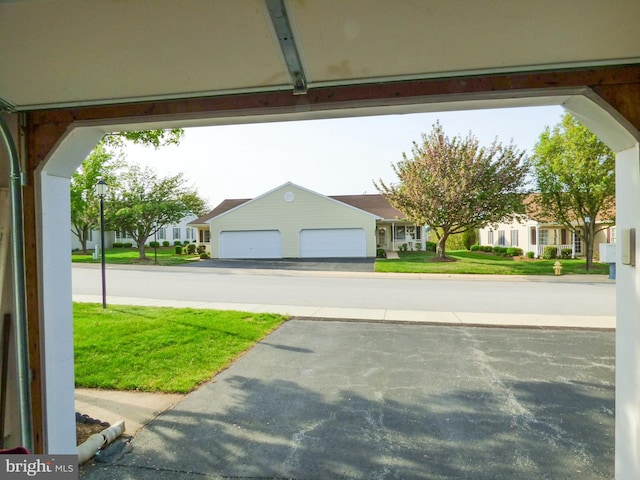 exterior space featuring street lighting and a residential view
