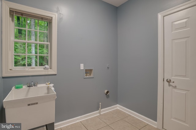 12868 Paddle Wheel Ct, Manassas, VA 20112 - laundry room featuring washer hookup, light tile patterned flooring, hookup for an electric dryer, and baseboards