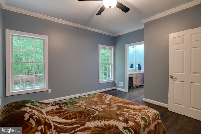 12868 Paddle Wheel Ct, Manassas, VA 20112 - bedroom featuring multiple windows, crown molding, baseboards, and dark wood finished floors