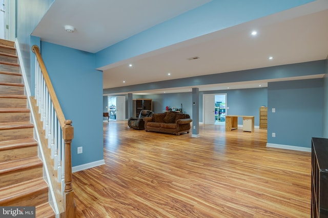 12868 Paddle Wheel Ct, Manassas, VA 20112 - living room with stairway, light wood finished floors, recessed lighting, and baseboards