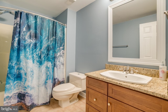 12868 Paddle Wheel Ct, Manassas, VA 20112 - bathroom with tile patterned flooring, toilet, vanity, and shower / bath combination with curtain