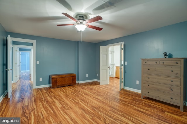 12868 Paddle Wheel Ct, Manassas, VA 20112 - unfurnished bedroom with light wood-style flooring, baseboards, and ceiling fan