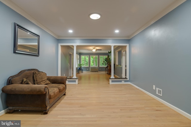 12868 Paddle Wheel Ct, Manassas, VA 20112 - sitting room featuring decorative columns, crown molding, wood finished floors, baseboards, and recessed lighting