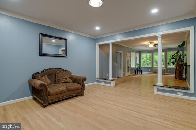 12868 Paddle Wheel Ct, Manassas, VA 20112 - sitting room with ornate columns, ornamental molding, wood finished floors, baseboards, and recessed lighting