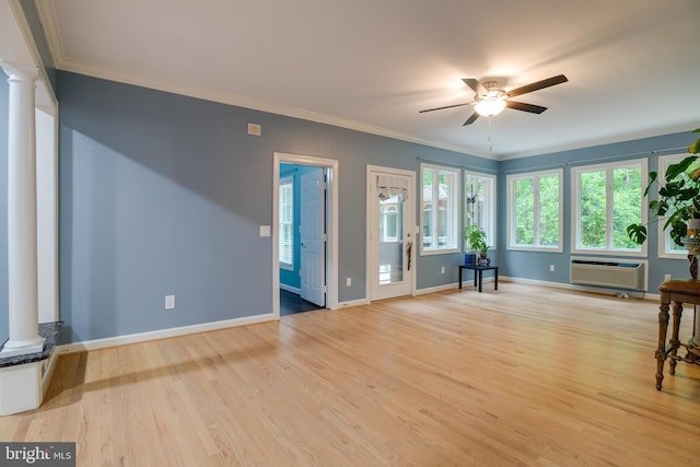 12868 Paddle Wheel Ct, Manassas, VA 20112 - unfurnished living room with ornate columns, ceiling fan, light wood-style floors, and crown molding