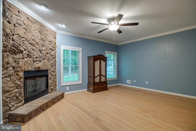12868 Paddle Wheel Ct, Manassas, VA 20112 - unfurnished living room featuring wood finished floors, a fireplace, ceiling fan, crown molding, and baseboards