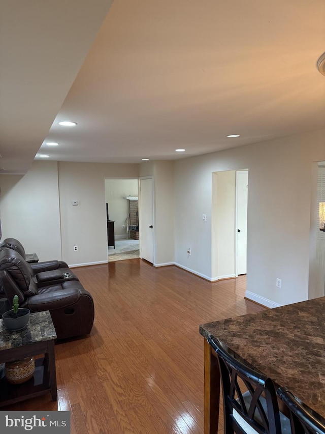 8549 Stonewall Rd, Manassas, VA 20110 - living room featuring recessed lighting, baseboards, and dark wood-style floors