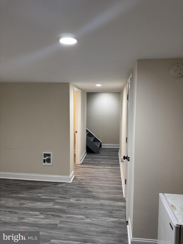 8549 Stonewall Rd, Manassas, VA 20110 - corridor with stairs, baseboards, dark wood-type flooring, and recessed lighting