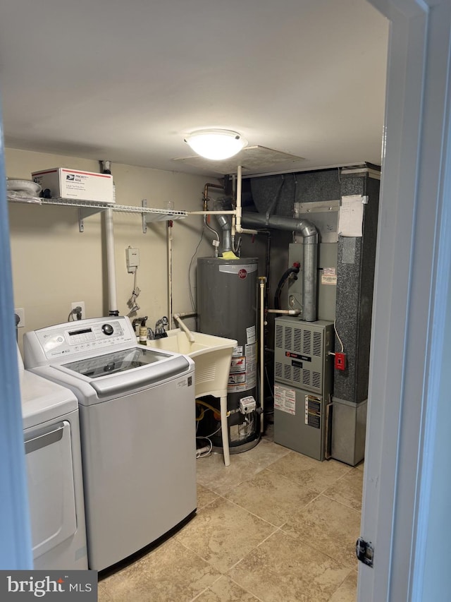 8549 Stonewall Rd, Manassas, VA 20110 - washroom with laundry area, water heater, washer and dryer, and heating unit