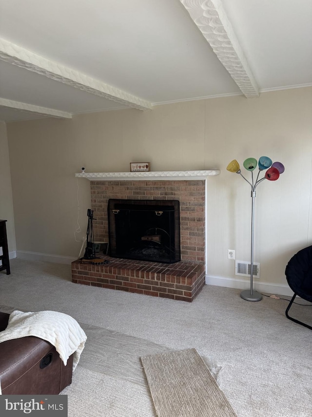 8549 Stonewall Rd, Manassas, VA 20110 - living room with carpet, a brick fireplace, visible vents, baseboards, and beamed ceiling