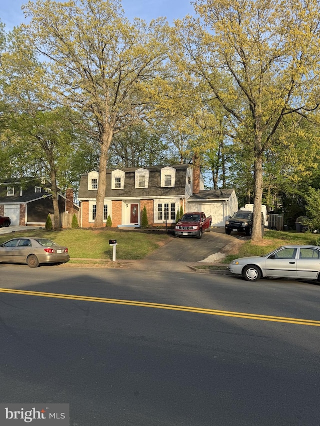 8549 Stonewall Rd, Manassas, VA 20110 - view of front of property featuring brick siding and a front yard