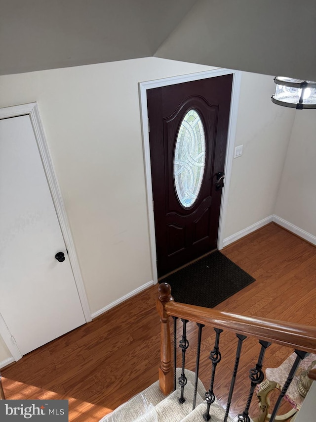 8549 Stonewall Rd, Manassas, VA 20110 - entryway featuring baseboards and wood finished floors