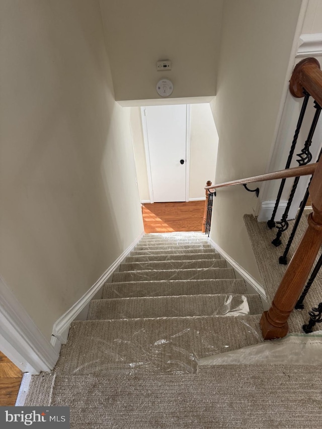 8549 Stonewall Rd, Manassas, VA 20110 - stairway with baseboards