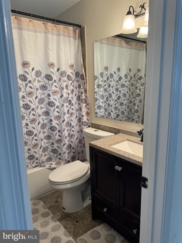 8549 Stonewall Rd, Manassas, VA 20110 - full bathroom with vanity, toilet, shower / tub combo, and tile patterned floors