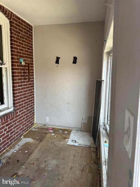 interior space with brick wall